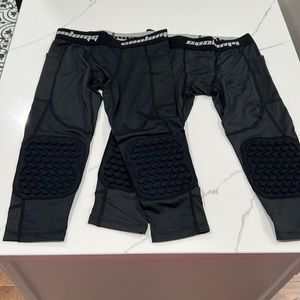 Youth basketball compression pants with knee pads